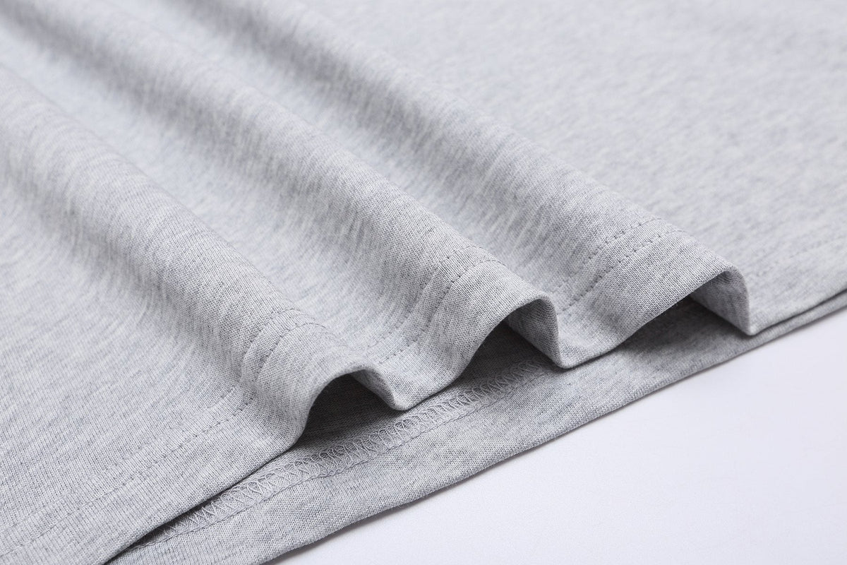 ESSENTIALS Repeated Graphic Short-Sleeve T-Shirt
