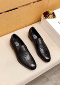 Versace Embossed Leather Slip-On Shoes